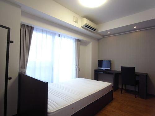 Palace Studio Shinjuku Tochomae Tokio Habitación foto
